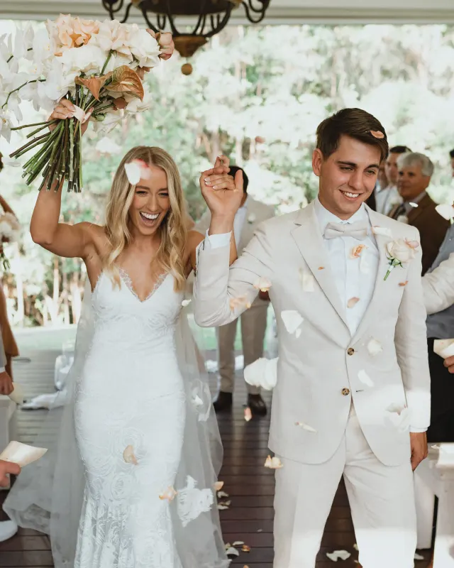 A wedding reception moment with guests celebrating together
